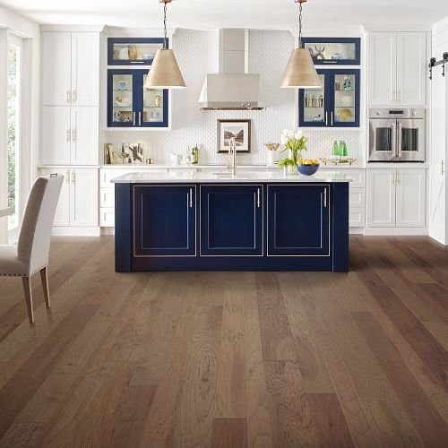 Brown hardwood and a blue countertop from Carpet Clearance Warehouse in Keene, NH